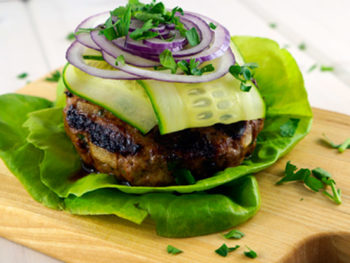 Lamb Burger With Cucumber + Lemon Tahini Sauce